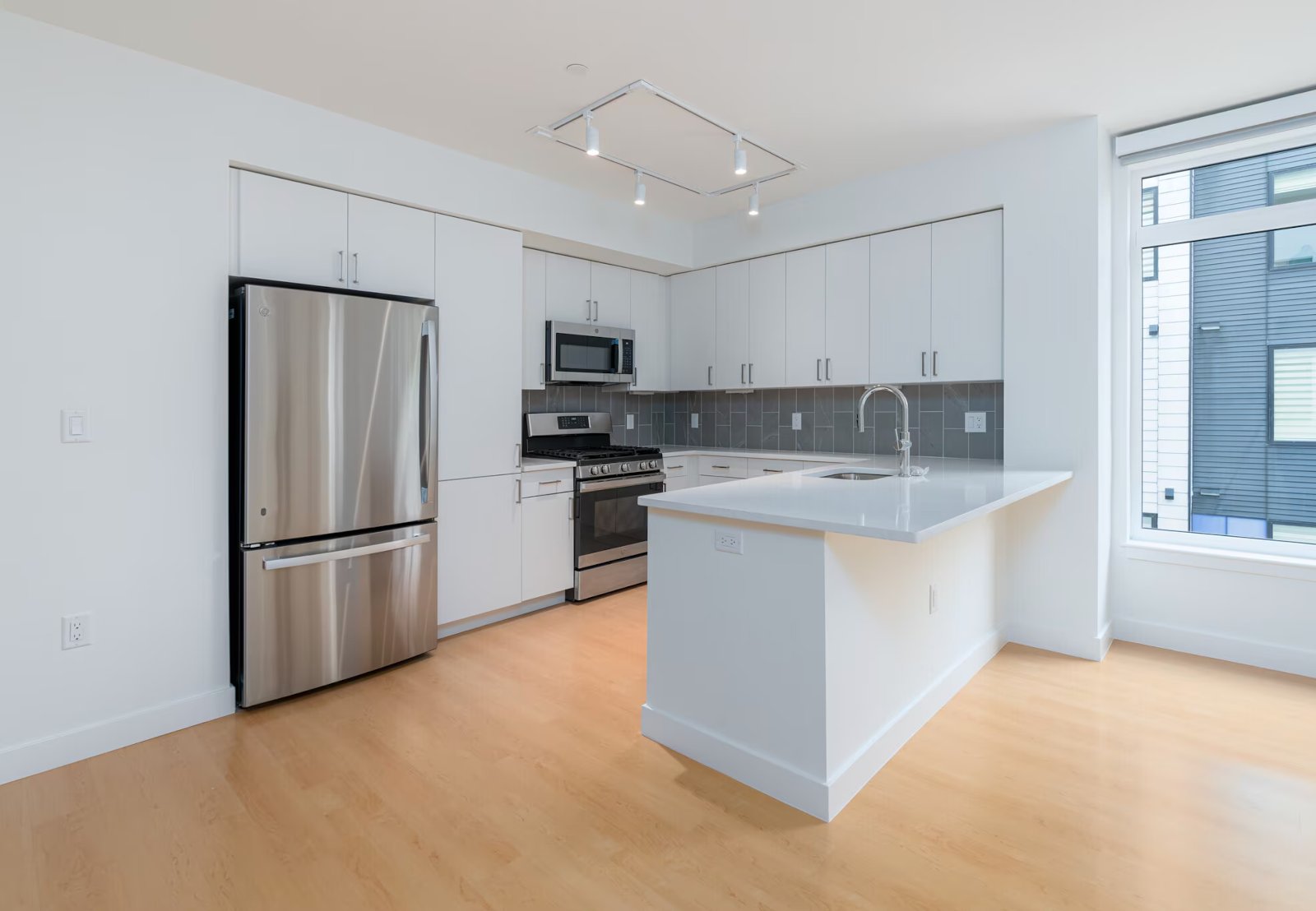 Sample kitchen, move-in baseline condition, no people