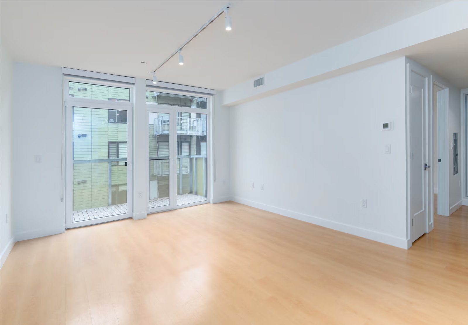 Bright, well-documented living room — the standard every ClearFrame visit follows, no people